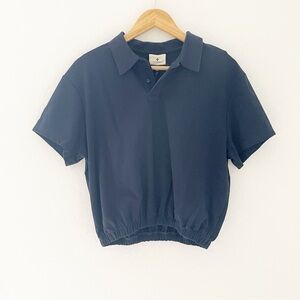Tuckernuck pique polo with banded hem size small